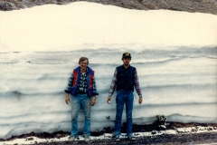 Jeff and Dan getting snowed on (in June!) next to an 8 foot drift