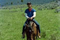 Jeff asleep on a horse